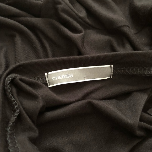 Rounded Neck, Loose Fit, Peplum Style Top - Picture 6 of 7